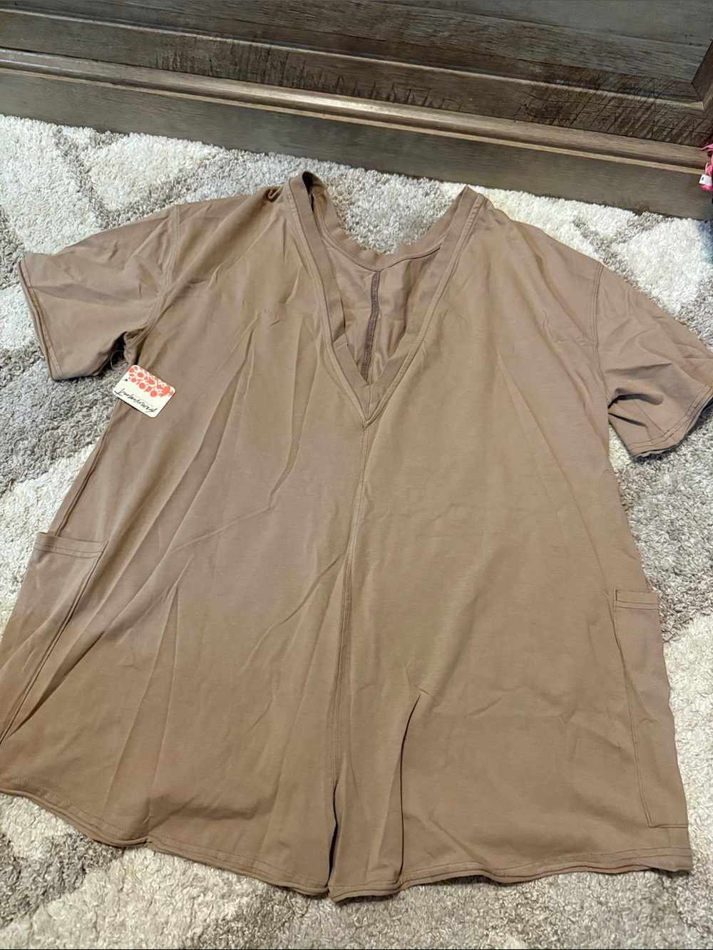 Free People hot shot romper in the color mocha latte.